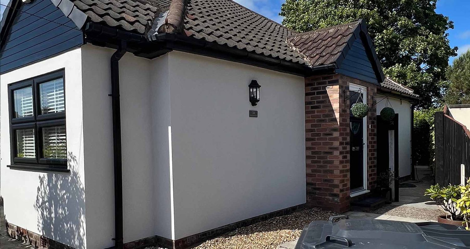 Rendered bungalow in Formby by Callaghan Plastering